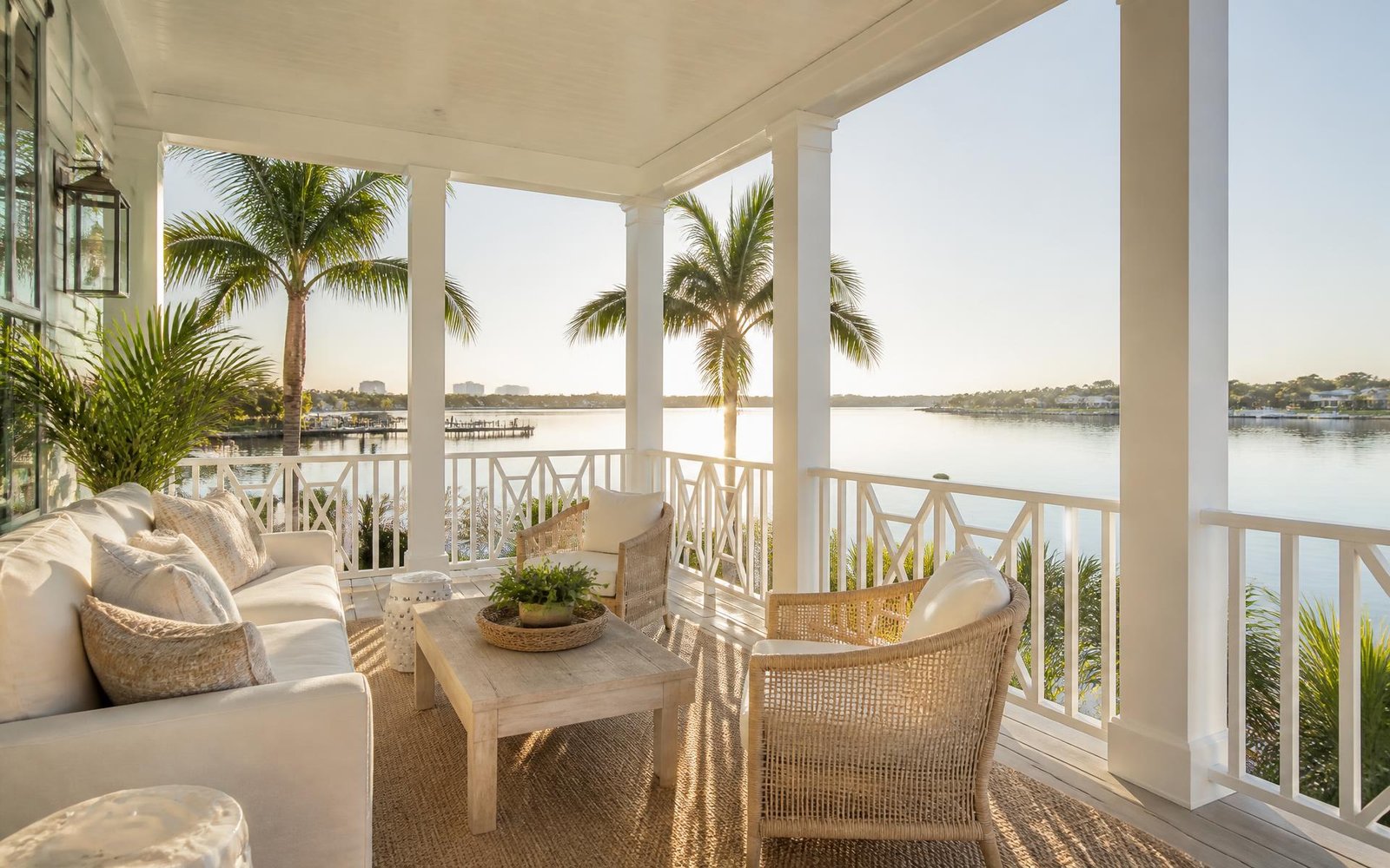 Sunlit waterfront porch of a coastal Treasure Coast home